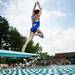 A young participant hurdles into a dive during the first day of the Washtenaw Interclub Swim Conference Championships on Monday, July 22. Daniel Brenner I AnnArbor.com